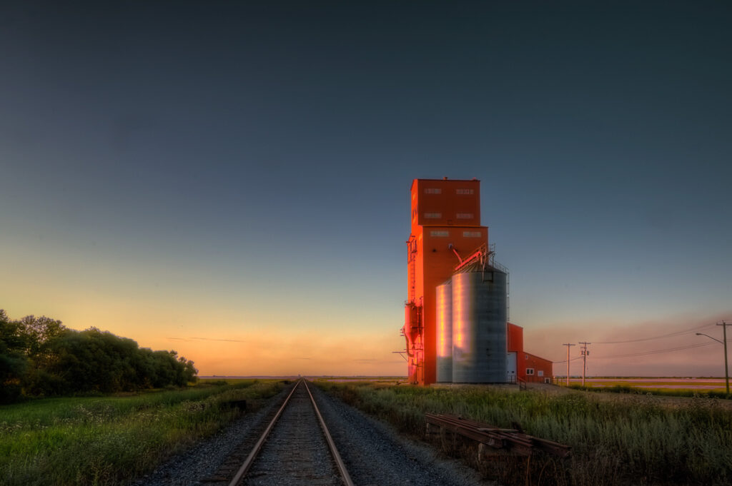 Single building/silo in middle of prairie.